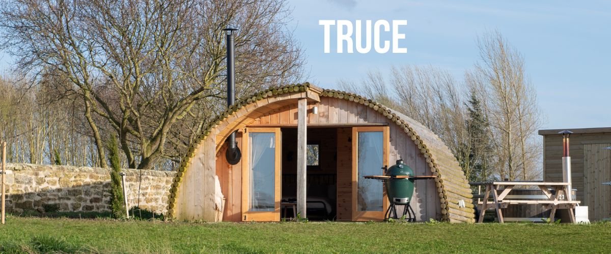 Luxury glamping pod with Big Green Egg BBQ and outdoor seating at The Hygge Out Yorkshire