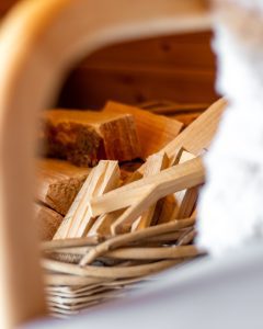 Shelter Pod kindling in wood basket, North Yorkshire glamping accommodation