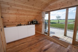 Kitchen with view from front doors in Truce Pod Scarborough North Yorkshire