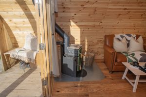 Wood-burning stove in Truce Pod