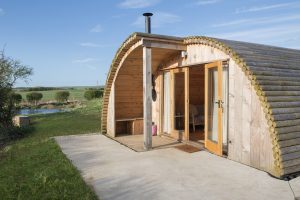 Shelter Pod exterior patio with seating area, North Yorkshire glamping