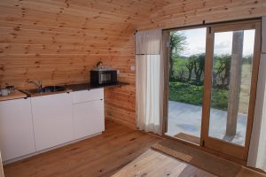 Shelter Pod fully equipped kitchenette interior, North Yorkshire glamping accommodation