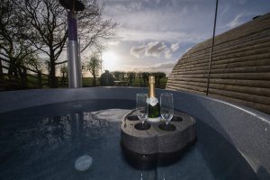 Shelter Pod floating drinks holder in hot tub with countryside views, North Yorkshire glamping