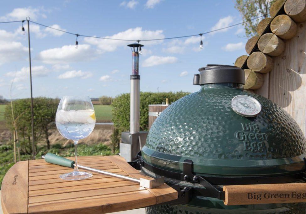 Copy of 53638474378_1d27fe4b7a_o Steaks cooking on Big Green Egg barbecue at glamping pod Yorkshire